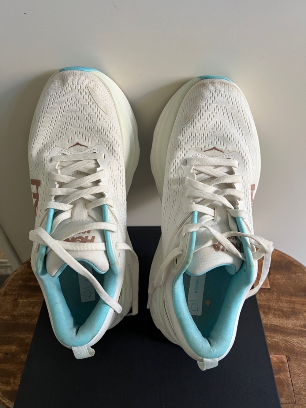 Hoka Bondi 8 in the "Frost / Rose Gold" colorway. - Picture 3 of 5